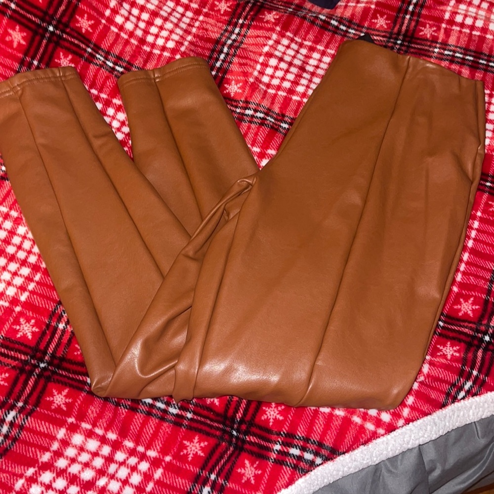 Brown leather pants. Only worn once.size large